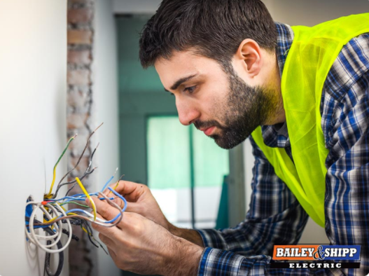 Electrician checking wiring 